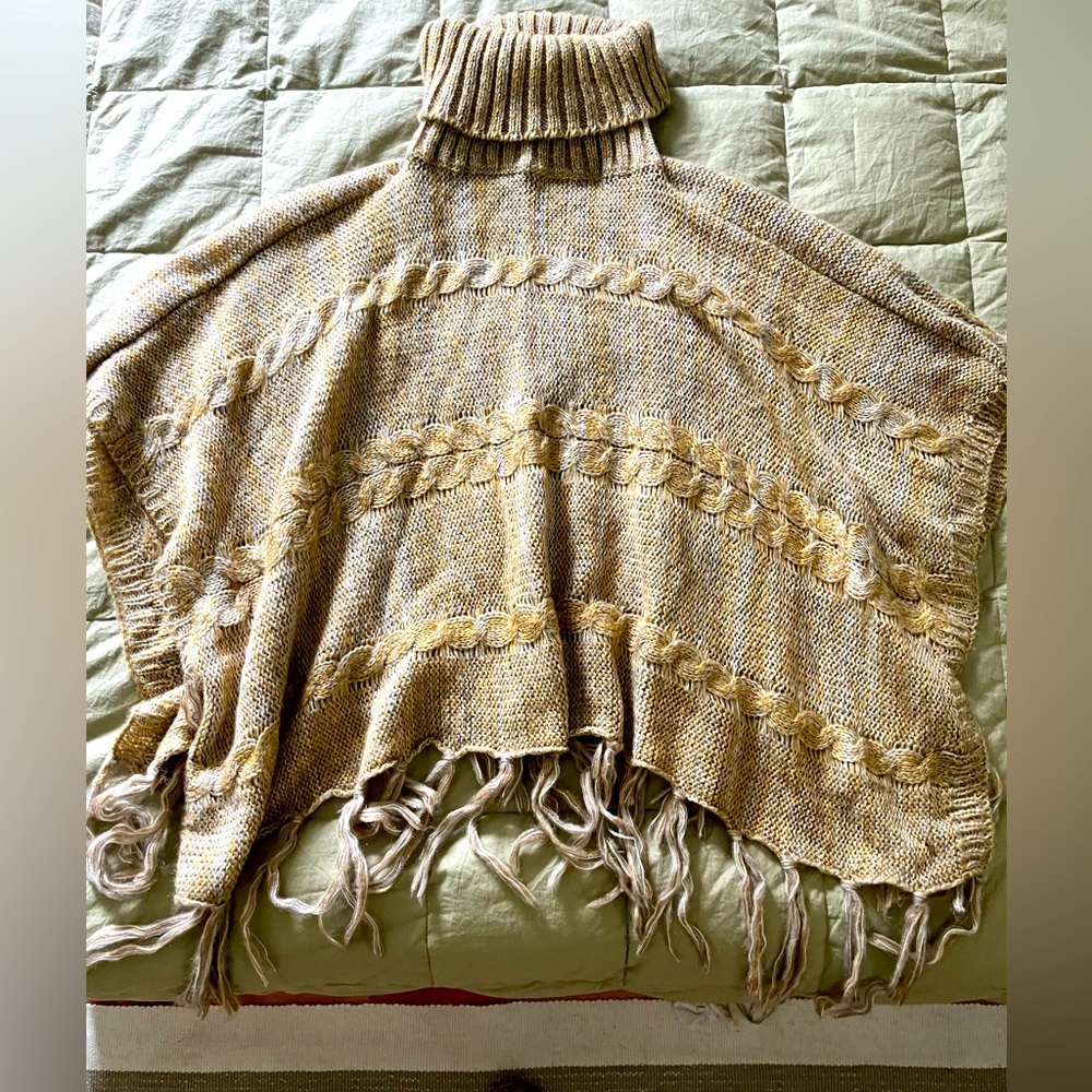 Tan/yellow poncho from mountains in North Carolina